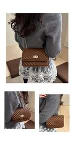 Detail of a brown quilted leather crossbody bag with gold chain and rectangular twist lock