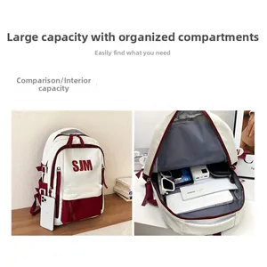 Internal view of a large white and burgundy backpack showing spacious laptop compartments