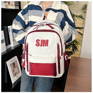 Detail view of large-capacity school backpack with stylish contrast color design