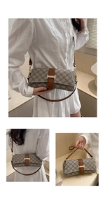 Detailed views of vintage monogram baguette bag with gold H-buckle and leather strap