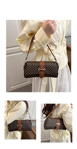 Detail of vintage baguette shoulder bag with brown geometric pattern and gold buckle