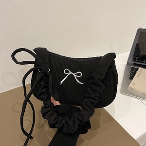 Retro black corduroy shoulder bag with white bow embroidery and cloud pleated strap
