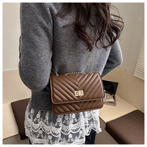 Brown PU leather crossbody bag with V-quilted pattern and gold chain strap detail