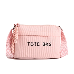 Pink corduroy tote bag for women featuring a stylish geometric woven shoulder strap