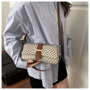 Borsa a tracolla retrò chic a pois blu con cinturino in pelle coordinato