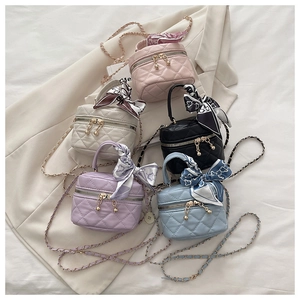 Detailed collection of quilted chain crossbody bags with silk scarves and gold zip beads