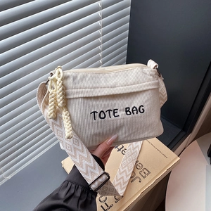 Chic beige corduroy tote bag with embroidered letters and ethnic style wide strap