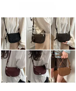 Detailed views of crossbody half-moon bags in four colors with adjustable knotted straps