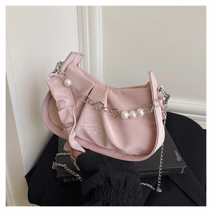 Pink pleated hobo bag featuring flower metal charms and white pearl beaded handle detail