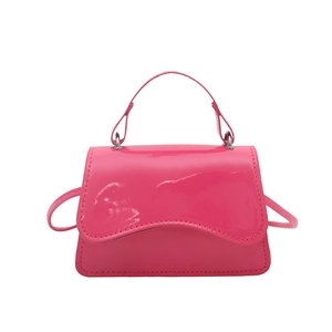 Minimalist glossy fuchsia patent leather mini square handbag with wavy flap and shoulder strap