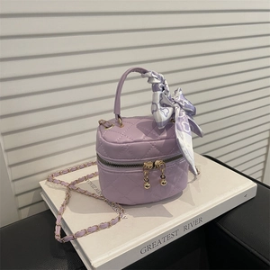 Quilted purple mini bucket bag with scarf bow and gold chain strap for girls