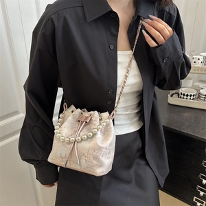 Chinese style bucket bag with elegant landscape embroidery and pearl handle for women