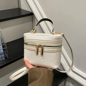 White crocodile pattern box bag with golden zippers and detachable shoulder strap