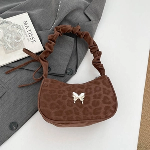 Brown leopard print shoulder bag with silver butterfly and pleated cloud strap