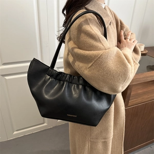 Black pleated cloud shoulder bag with FASHION BAGS logo and premium PU leather texture