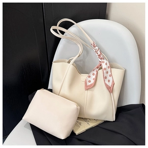 Cream faux leather tote with matching zipper pouch and polka dot silk scarf detail