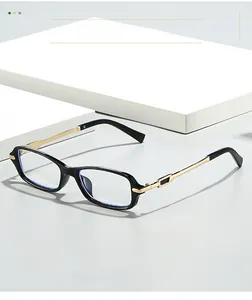 Macro view of black square frame eyewear with premium gold metal temples and details