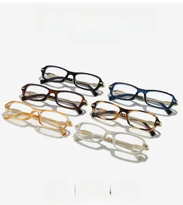 Macro shot of trendy square glasses frames in six assorted colors with gold metal accents