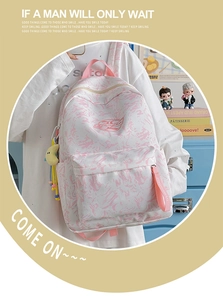Detail of waterproof marble pattern backpack with starry charm and pink zipper puller