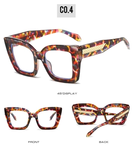 Macro detail of tortoiseshell square frame with gold woven texture metal temple detail