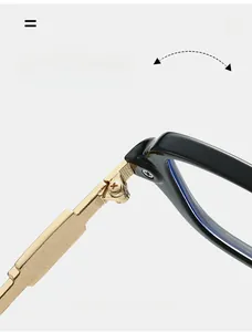 Macro shot of durable golden metal hinge on black resin square eyewear frames