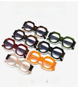 Detail showing various colors of polygon oversized eyewear frames in a stacked layout