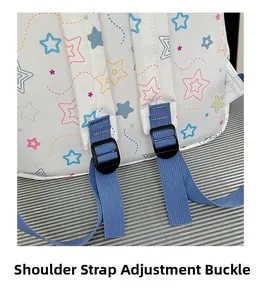 Detail of the adjustable shoulder strap buckle on white backpack with star print