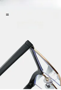 Detail of metal cat-eye frame hinge with anti-blue light lenses and black temples