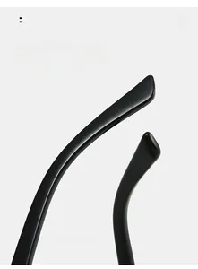 Detail of curved black mirror legs on cat-eye glasses frame for comfortable wear