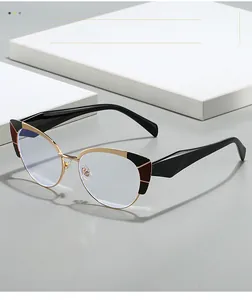 Detailed side view of cat-eye anti-blue light glasses with black and gold mixed frames