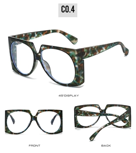 Three-angle view of oversized camouflage glasses frames in green, brown, and orange