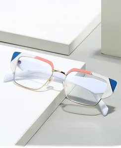 Detail of stylish 2025 cat-eye glasses with multicolor frame and gold metal accents