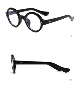 Detail view showing 45-degree and side profiles of retro black round frame sunglasses