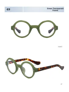 Detail view of round retro sunglasses in transparent green with tortoise shell temples