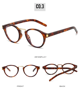 Detailed views of tortoise shell oval sunglasses with golden metal bridge accents