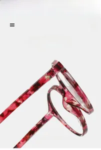 Macro detail of red tortoiseshell eyewear frame texture and high elastic metal hinges