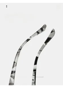 Detail of ergonomic curved mirror legs with stylish black and grey camo pattern