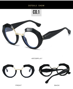 Detail view of oversized black geometric frames with a gold metal bridge from multiple angles