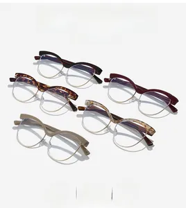 Cat eye glasses frames in tortoise, burgundy and gray colors with metal browline design