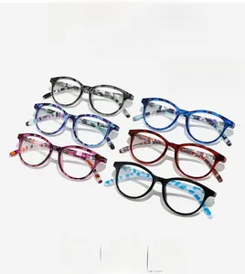 Close-up of stylish square frame readers in diverse floral and marble textures