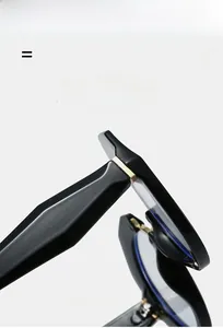 Detail of black frame glasses showing geometric temples and premium metal hinges