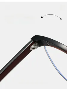 Detail of durable metal hinge and tortoiseshell frame on cat-eye glasses
