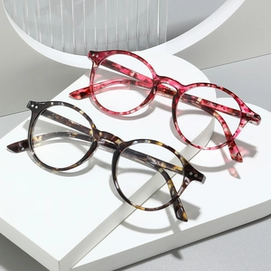 Retro round lightweight eyewear frames with tortoiseshell pattern and metal rivets