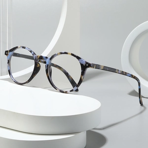 Retro round tortoiseshell glasses frames in blue and beige marble texture for women