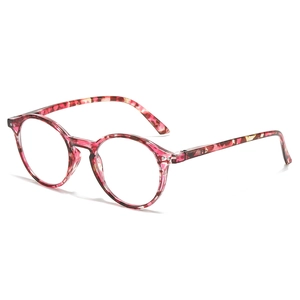 Retro round pink tortoiseshell eyeglasses frames with stylish metal rivet accents