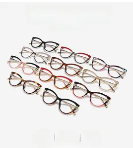 Selection of stylish cat eye blue light blocking glasses frames in various colors and patterns