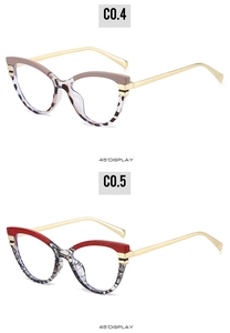 Close-up of cat-eye frames in brown leopard and red patterns with gold temples