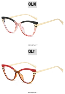 Close-up of cat-eye eyewear frames with metal temples in black, red and tortoiseshell patterns