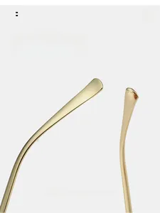 Close-up of golden metal glasses temples with curved anti-slip ends for comfort