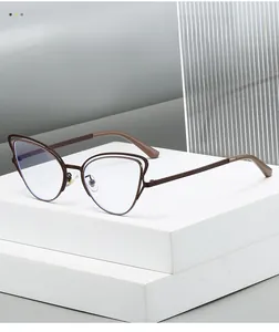 Detailed view of coffee-colored cat-eye metal glasses with double-layer frame design